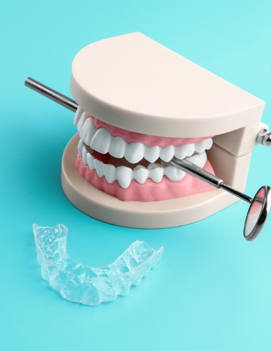 Model smile grinding teeth before nightguards for bruxism