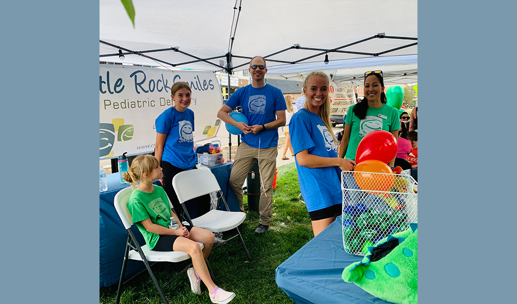 Group of pediatric dental team members volunteering together