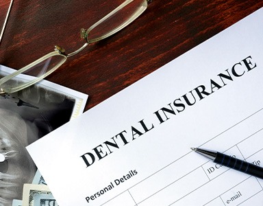 Dental insurance paperwork and X-rays