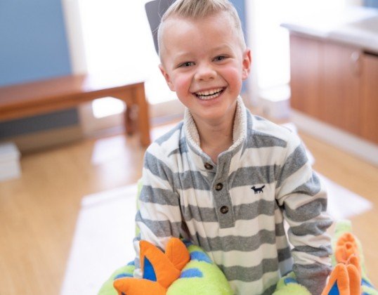 Child smiling during children's dental checkups and teeth cleaning visit