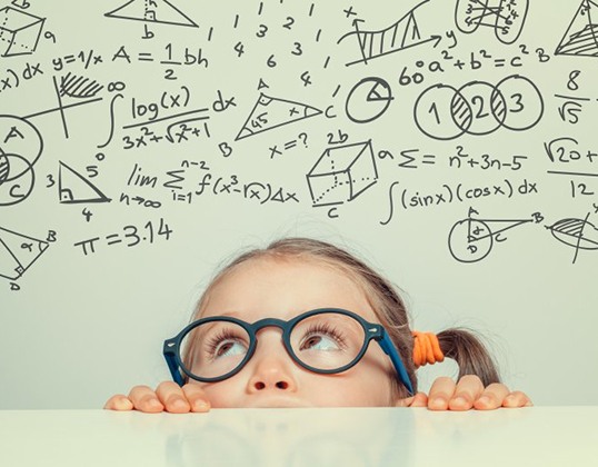 Child looking up at a million math equations 