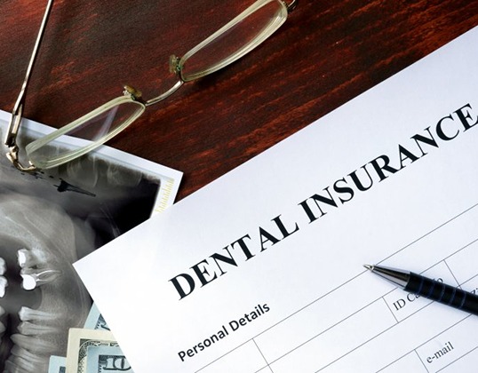 Dental insurance form resting on a desk
