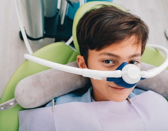 Child receiving nitrous oxide dental sedation