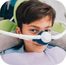 Child receiving nitrous oxide sedation dentistry