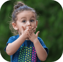 Child covering mouth before emergency dentistry