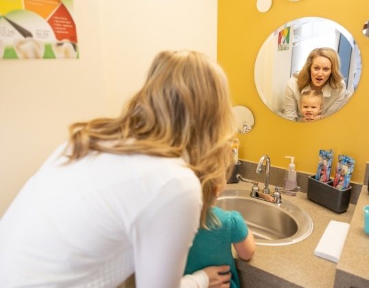 Mother and child enjoying the benefits of professional teeth whitening