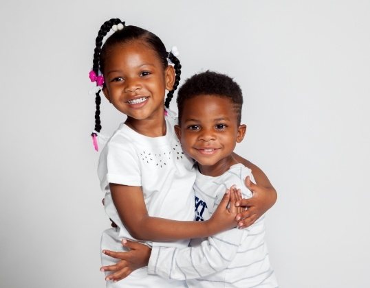 Kids smiling after dentistry for children