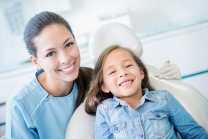 smiling child with dentist