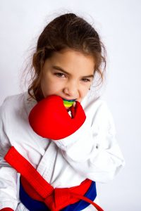 child putting in mouthguard