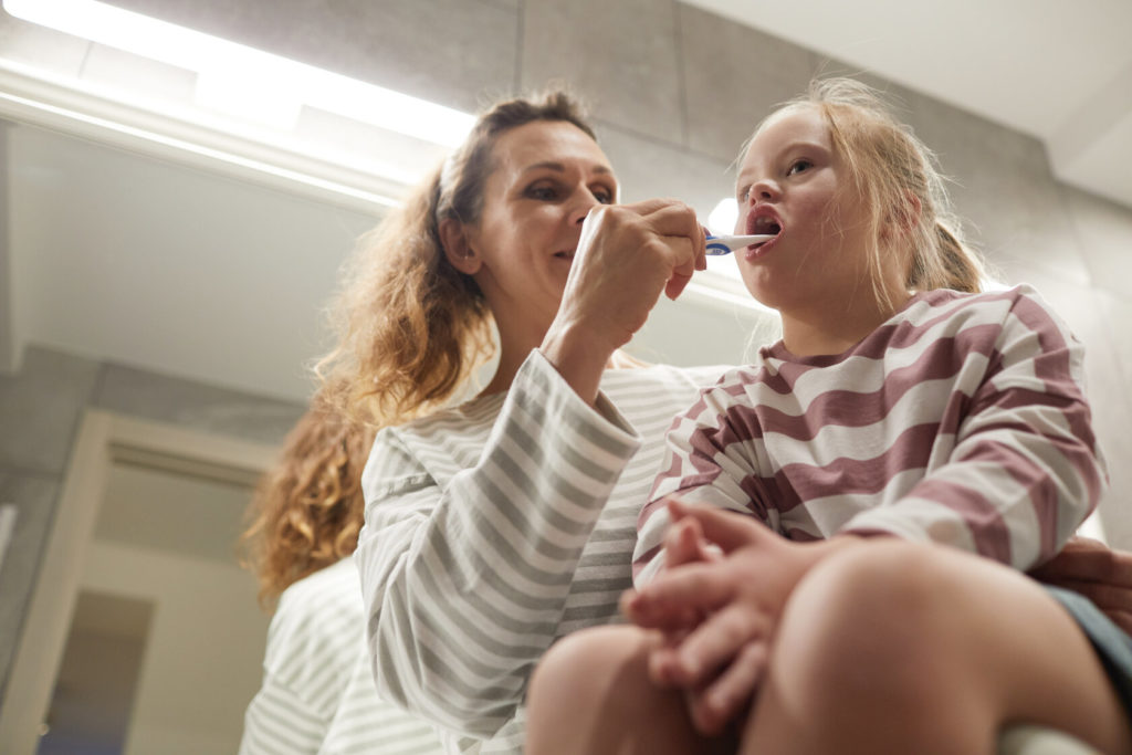 mom helping daughter with special needs dentistry in Castle Rock