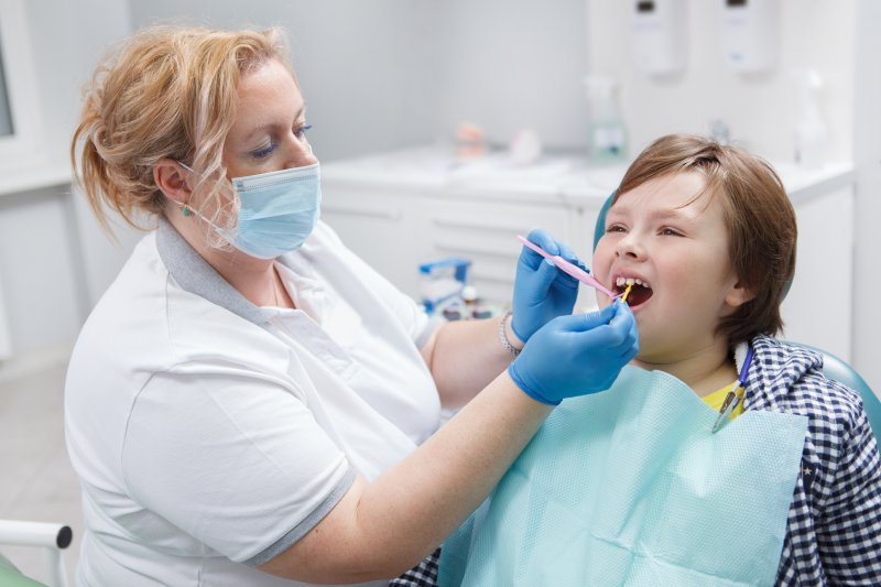 child receiving fluoride