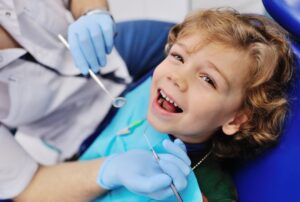 Child smiling at the dentist
